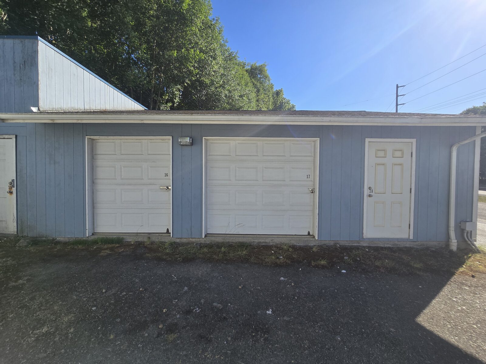 Row of garage-style storage unit doors in Port Angeles